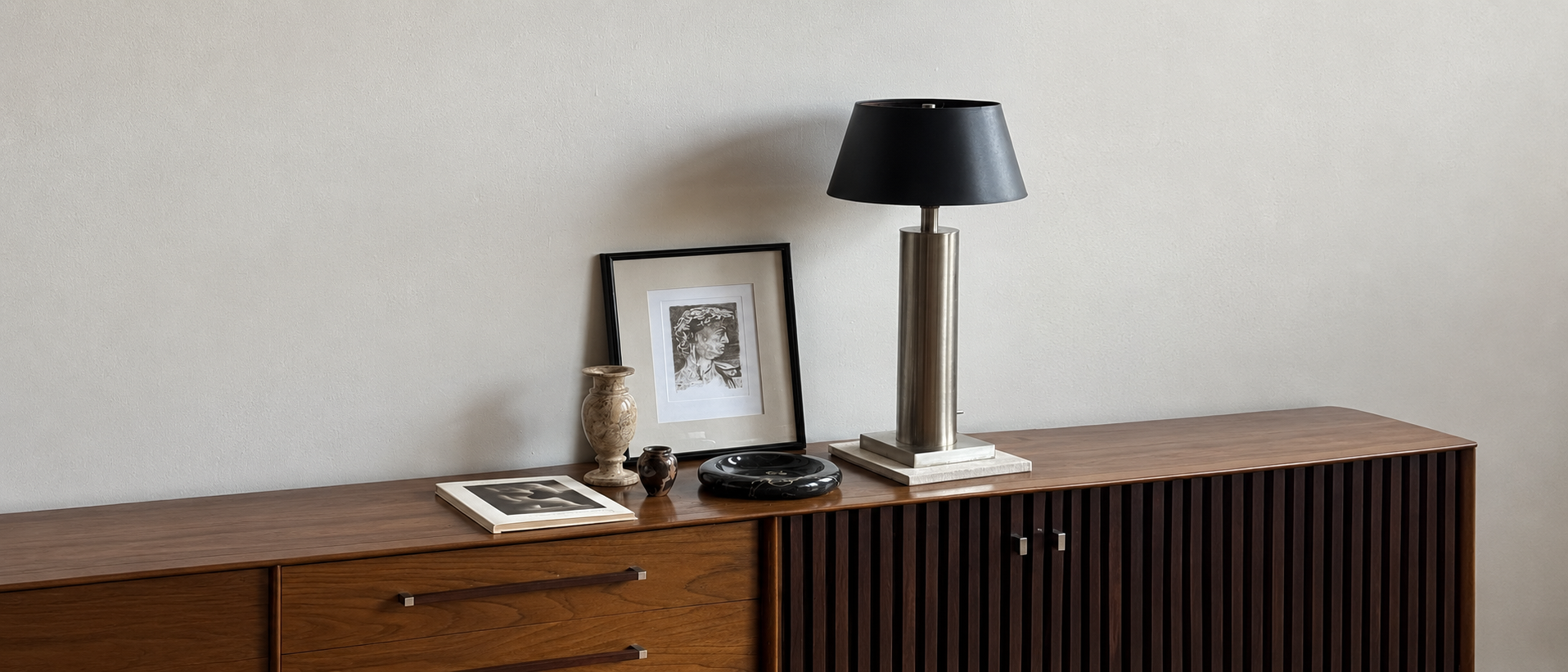 Considered objects arranged within a calm interior